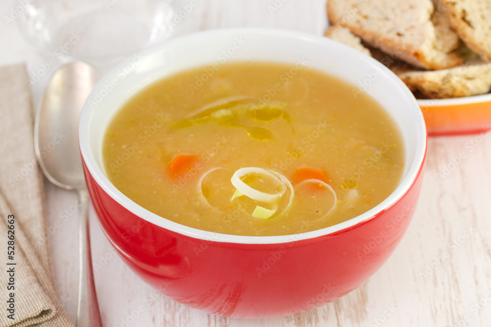 vegetable soup in red bowl with bread vegetable soup in red bowl with bread