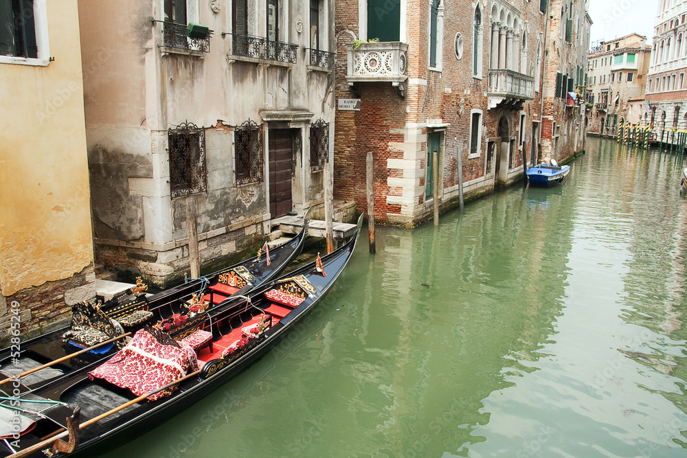 Canal and gondolas in Venice, Italy
