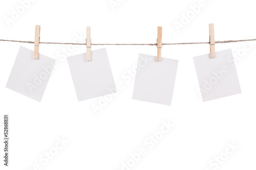 Foto Blank instant photo hanging on the clothesline