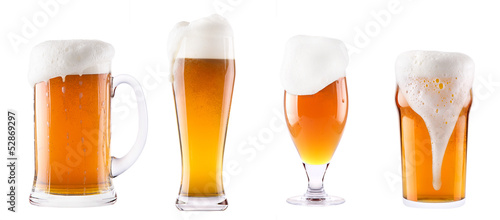 Frosty fresh beer collection with foam isolated