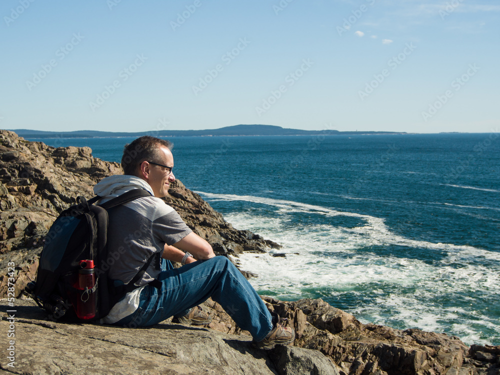 Man resting by the sea