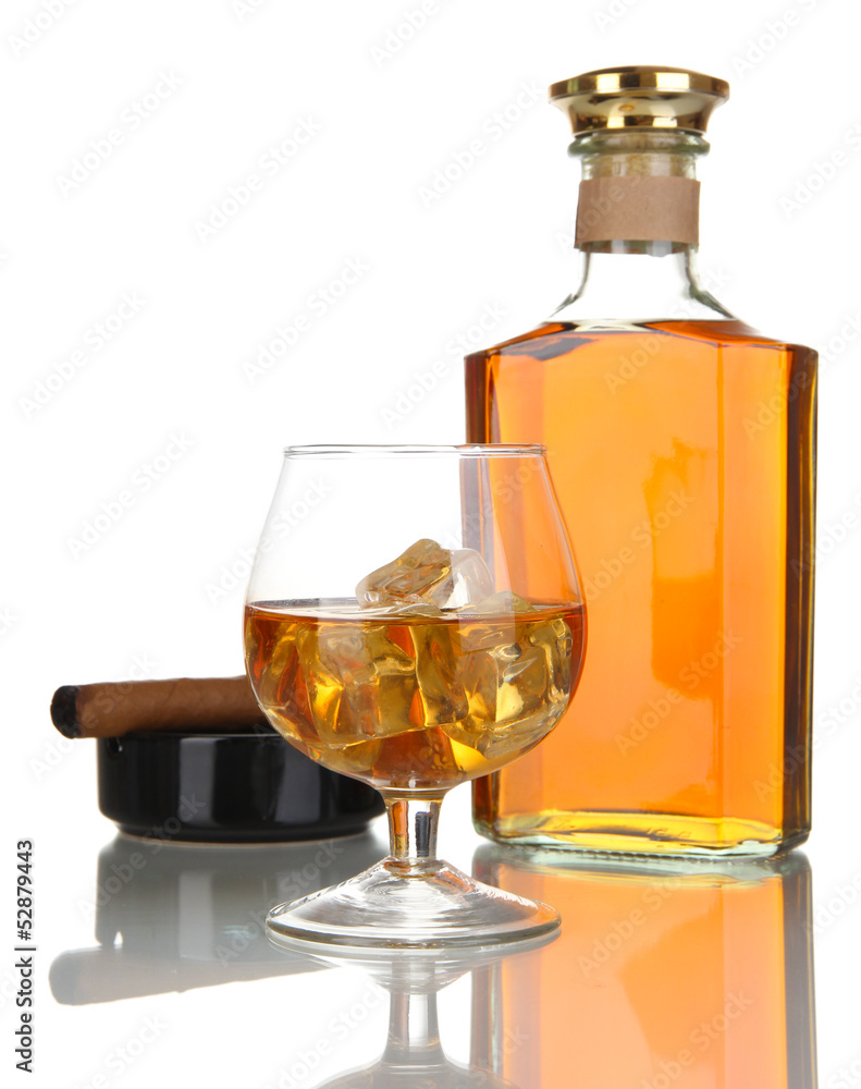Brandy with ice and cigar isolated on white Brandy with ice and cigar isolated on white