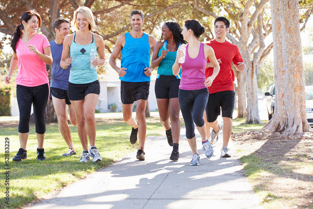 Group Of Runners On Suburban Street