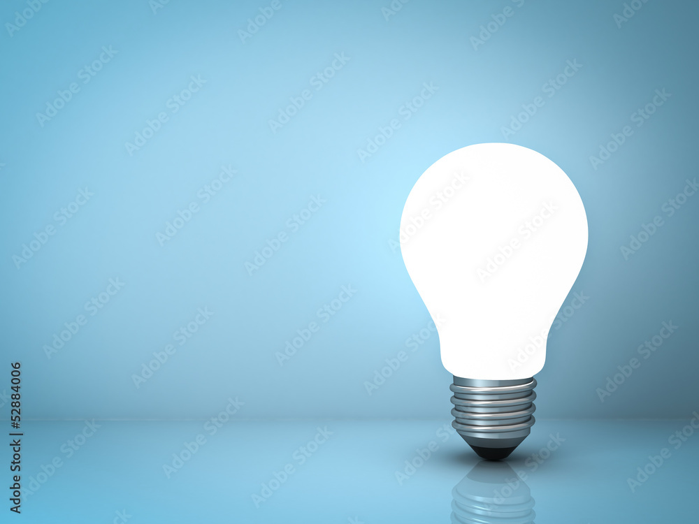 Light bulb standing on blue background with reflection Light bulb standing on blue background with reflection