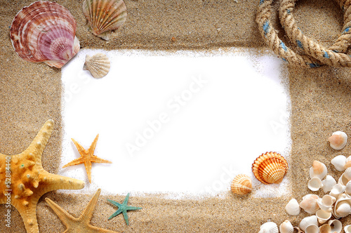 frame with sand and shells photo