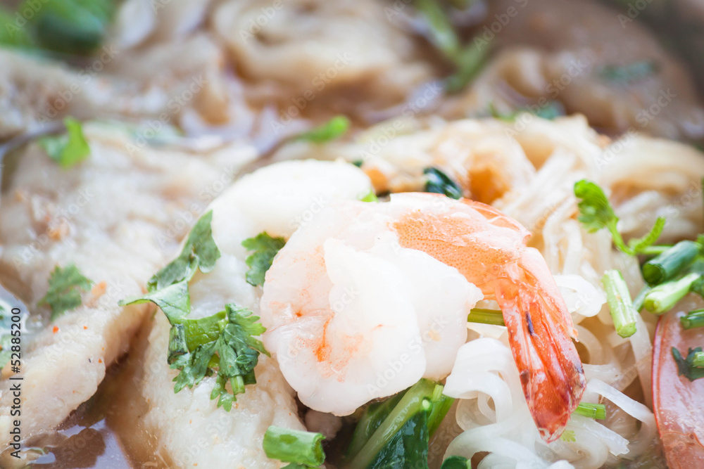 Close up shrimp topped on thai spicy noodles soup Close up shrimp topped on thai spicy noodles soup