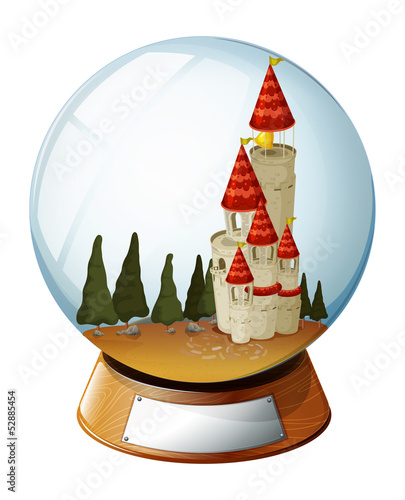A castle with pine trees inside a crystal ball