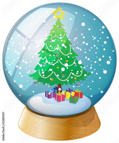 A crystal ball with a Christmas tree