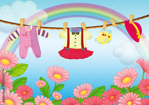 Baby clothes hanging in the garden