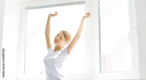 Girl stretching in the morning