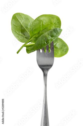 Baby spinach leaves on a fork