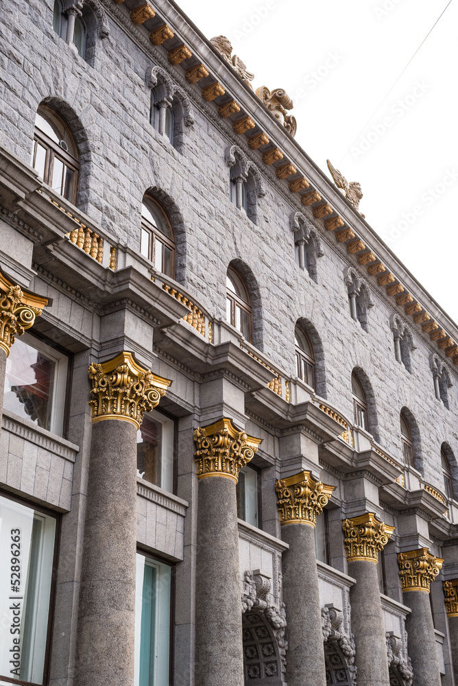 Fototapeta premium Facade with gold columns and windows
