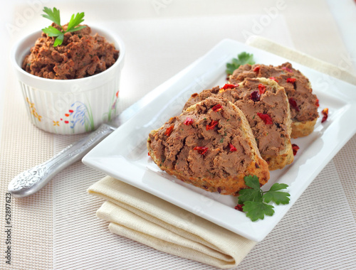 Liver pate with paprika on slices of wholegrain bread