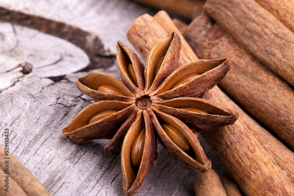 Different spices, Cinnamon, anise on wooden table Different spices, Cinnamon, anise on wooden table