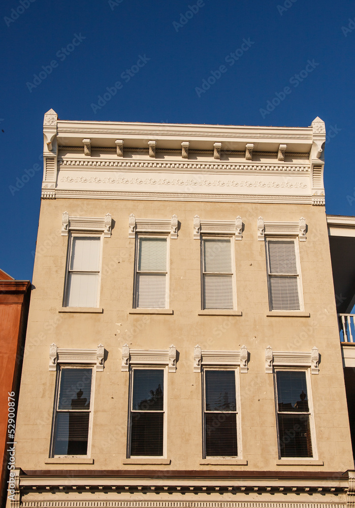 Obraz premium Brown Stone Building with Window Trim
