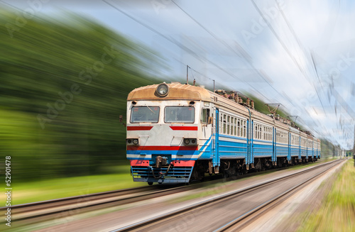 Suburban electric train on a blurred background