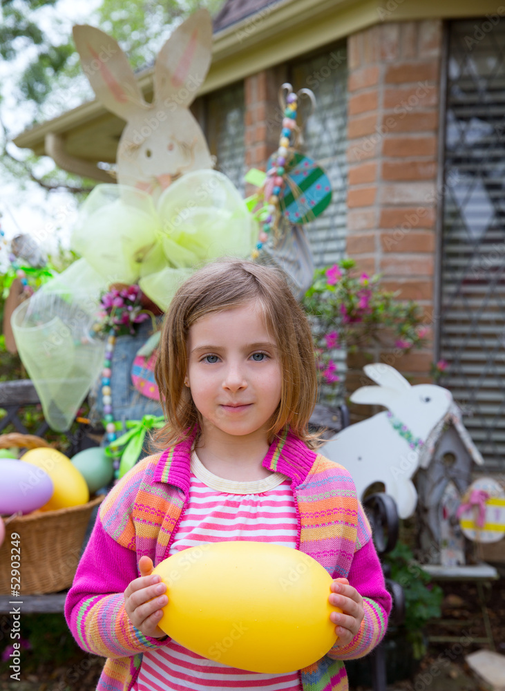 Easter blond girl holding big egg and bunny Easter blond girl holding big egg and bunny