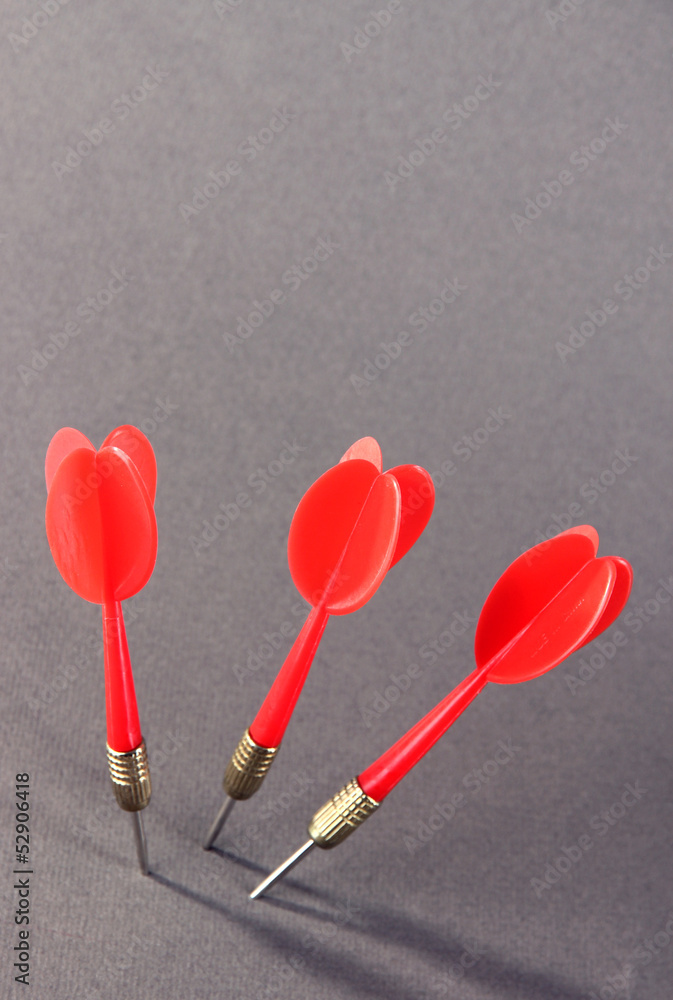 Darts on gray background Darts on gray background