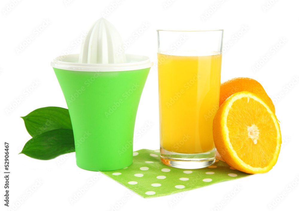 Citrus press, glass of juice and ripe oranges, isolated on Citrus press, glass of juice and ripe oranges, isolated on