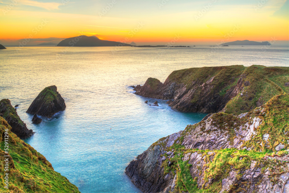 Sunset over Dunquin bay on Dingle Peninsula, Co.Kerry, Ireland Sunset over Dunquin bay on Dingle Peninsula, Co.Kerry, Ireland