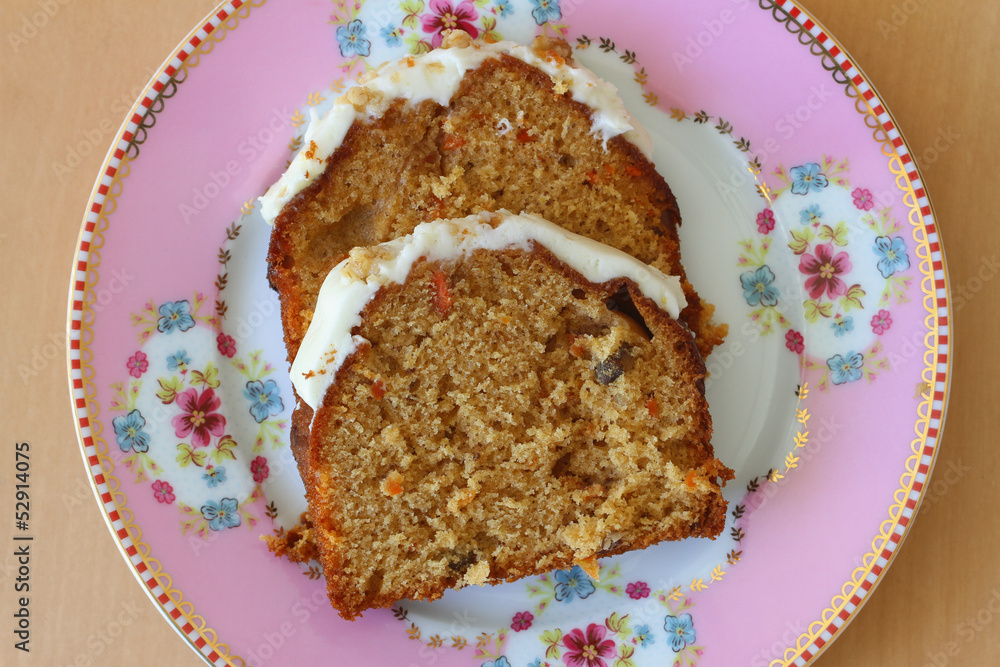 Carrot and walnut cake with marzipan icing, close up Carrot and walnut cake with marzipan icing, close up