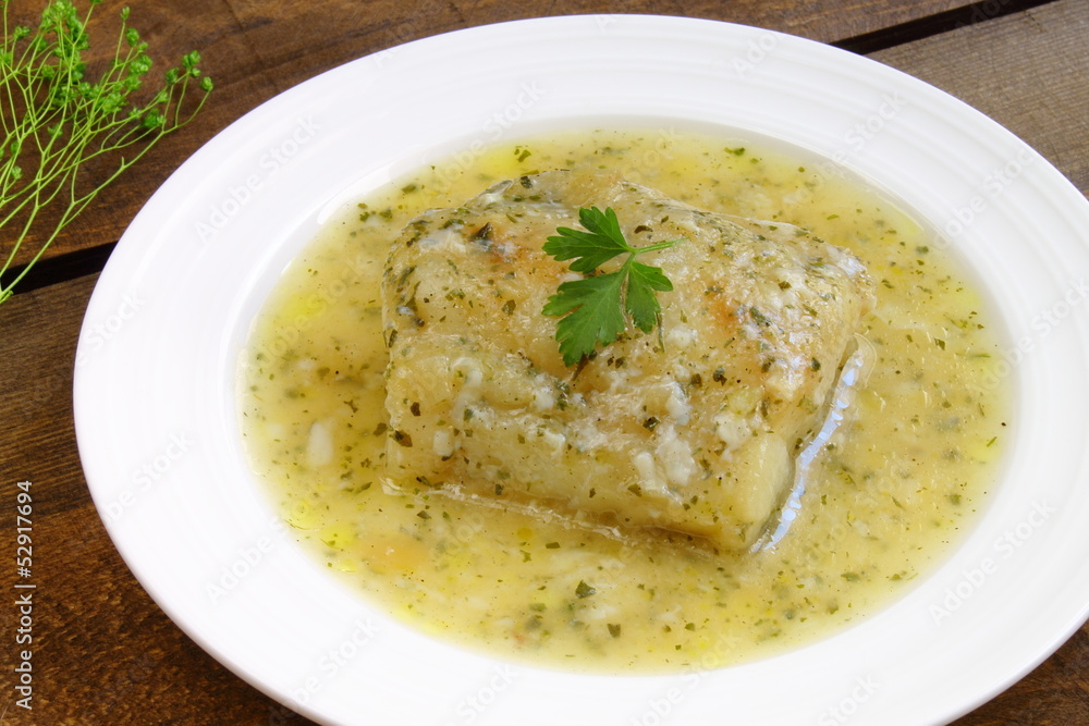 Cod fillet in a green sauce