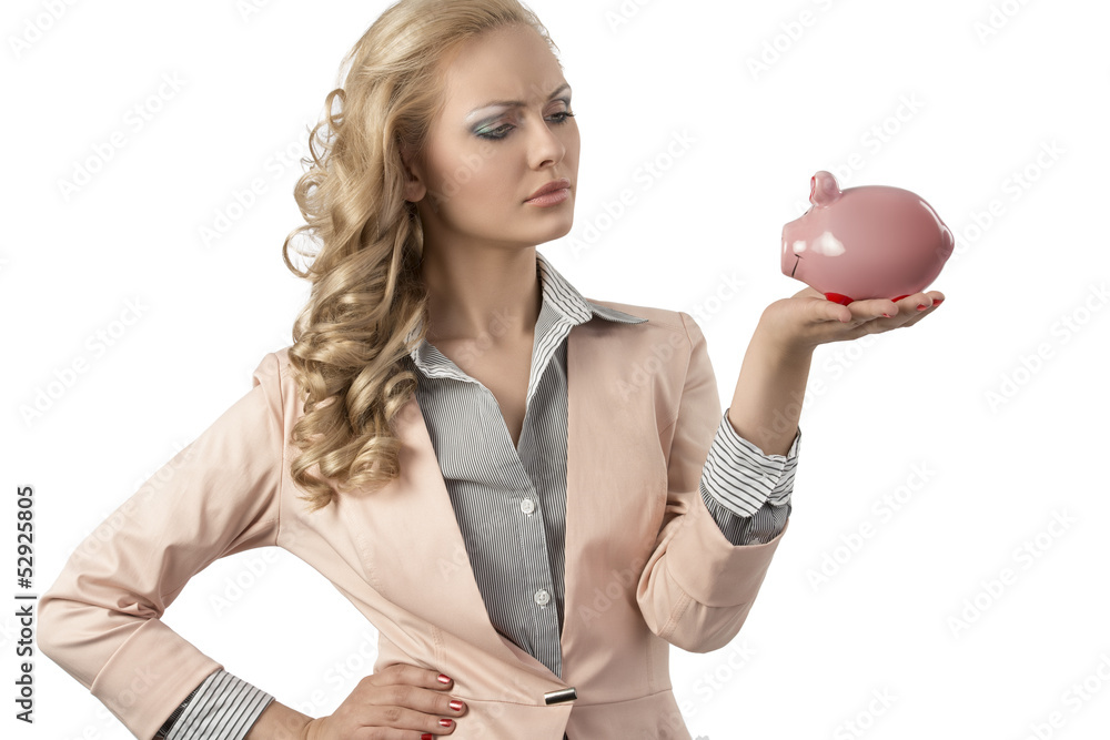 serious girl with piggybank