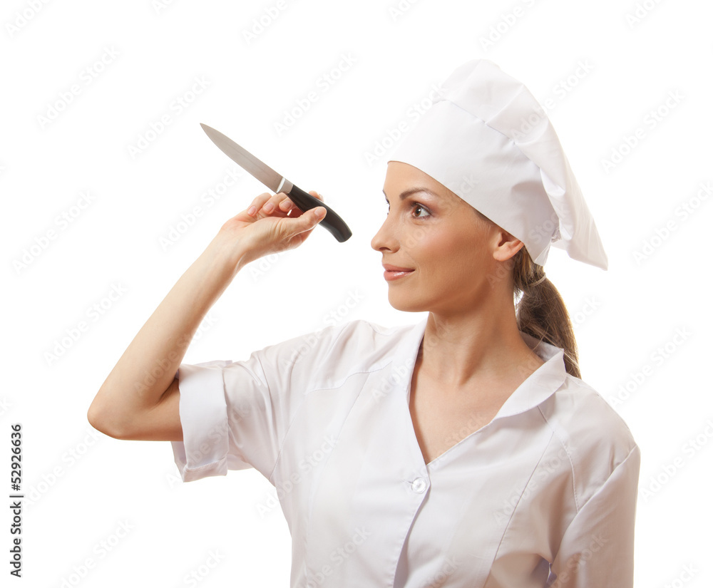 Woman cook holding a kitchen knife, isolated on white background Woman cook holding a kitchen knife, isolated on white background