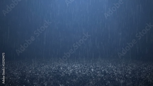 Rain on darkly blue background photo