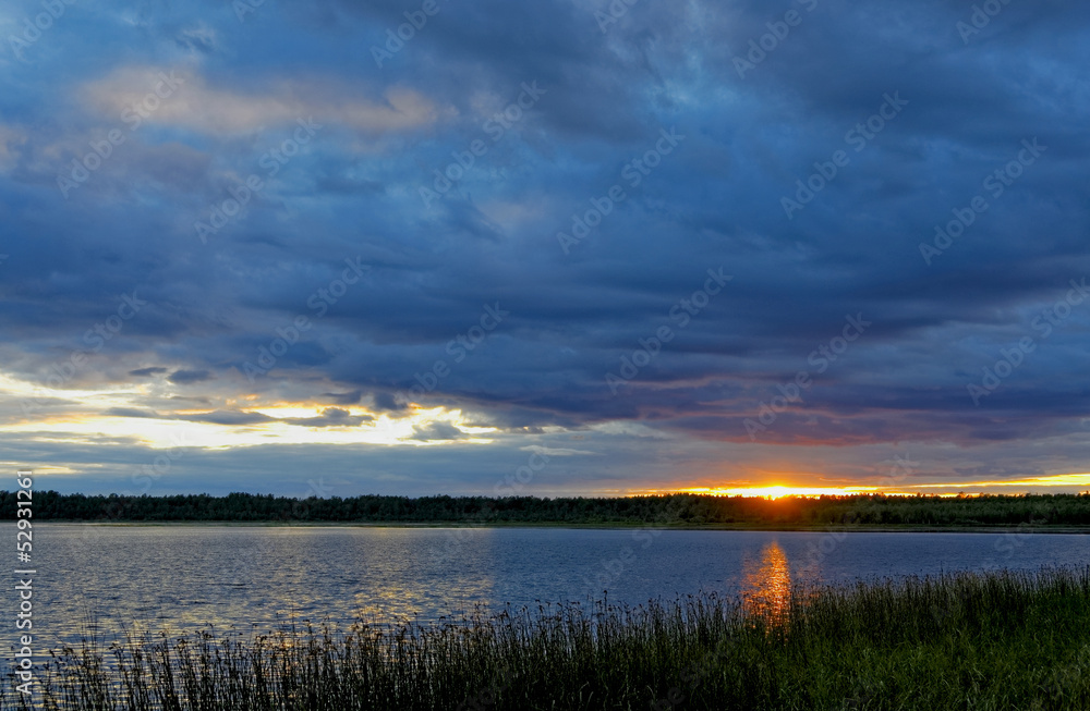 Sunset on the lake taiga