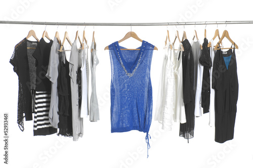 Female casual clothing hanging on hangers