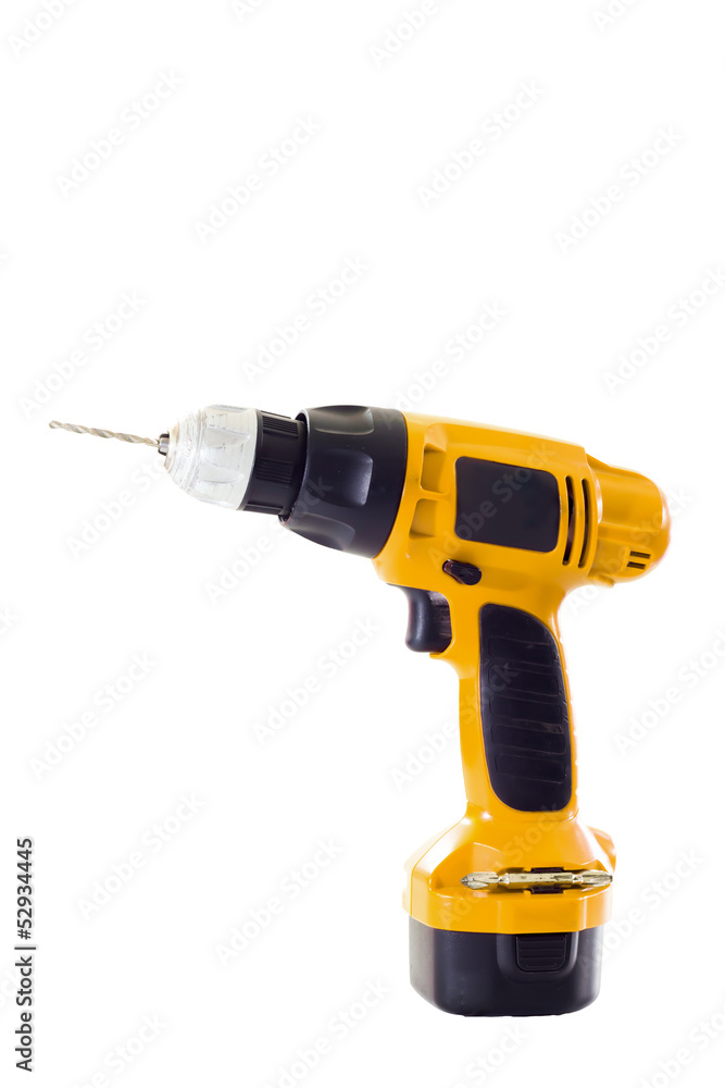 hand holding battery drill and drills wooden board, isolate