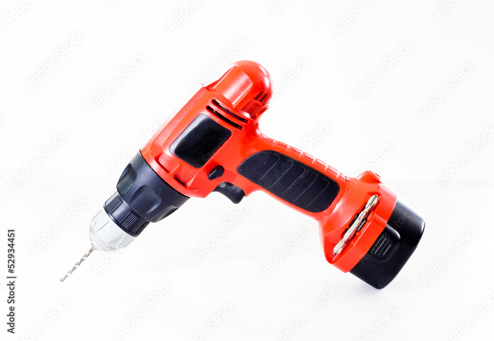 Hand holding battery drill and drills wooden board, isolate Hand holding battery drill and drills wooden board, isolate