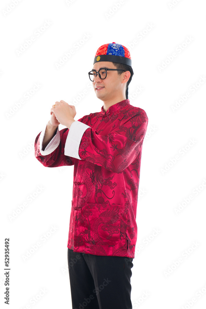 Fototapeta premium chinese new year male wishing gong xi fa cai isolated in white b
