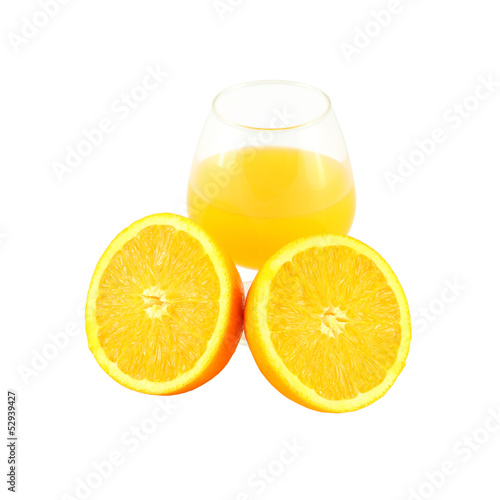 Foto Orange juice in brandy glass and two half fruit