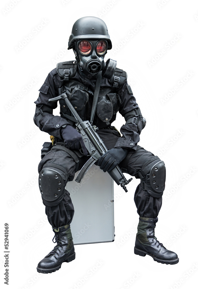 Special force soldier sitting in isolation background .