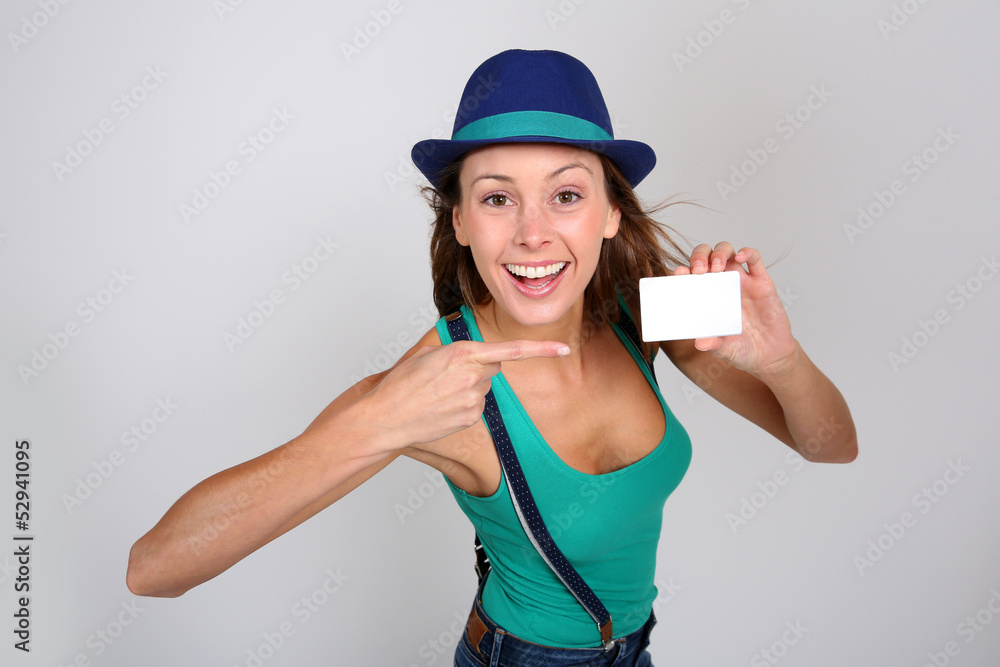 Beautiful stylish girl holding pass ticket Beautiful stylish girl holding pass ticket