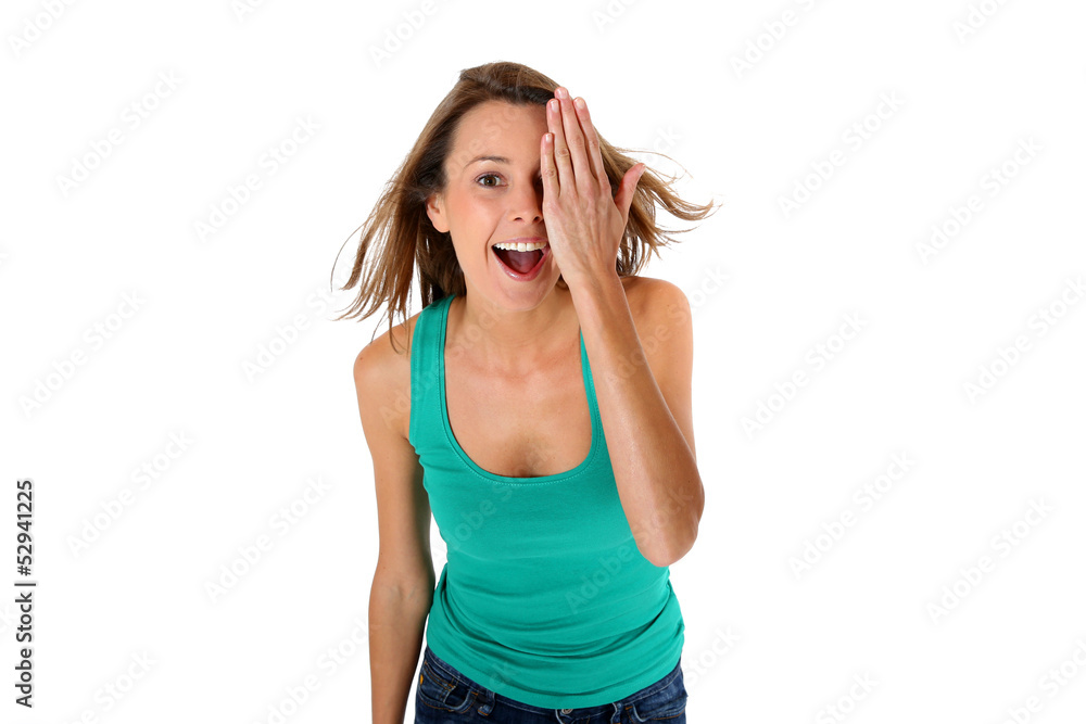 Beautiful girl covering one eye with hand Beautiful girl covering one eye with hand