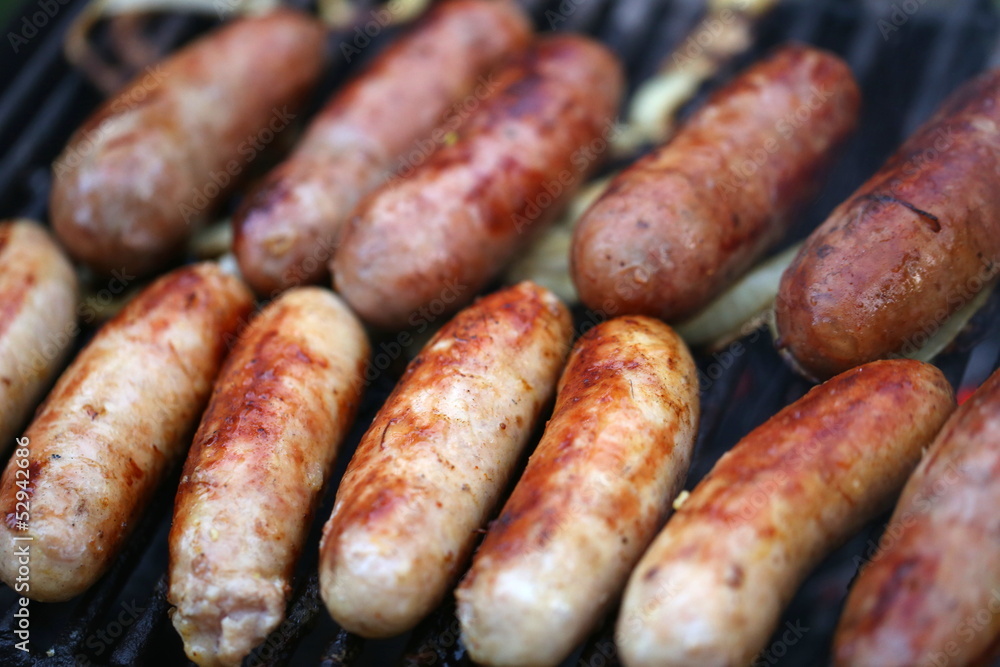 A lot of grilled sausages close up, barbecue A lot of grilled sausages close up, barbecue