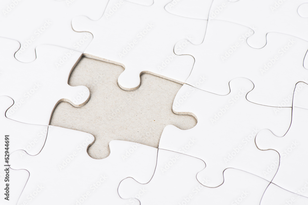 White puzzle with one missing piece