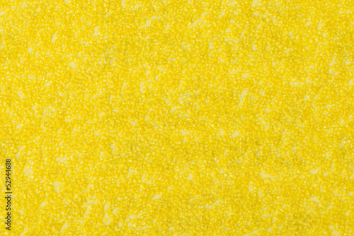 Background texture of yellow sandpaper photo