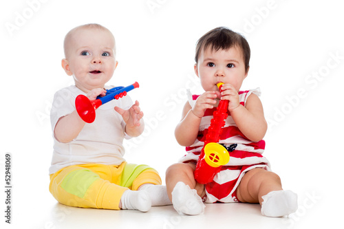 Babies girls play musical toy
