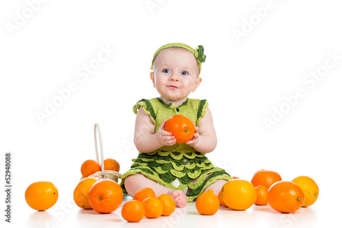 happy baby  girl with fruit...