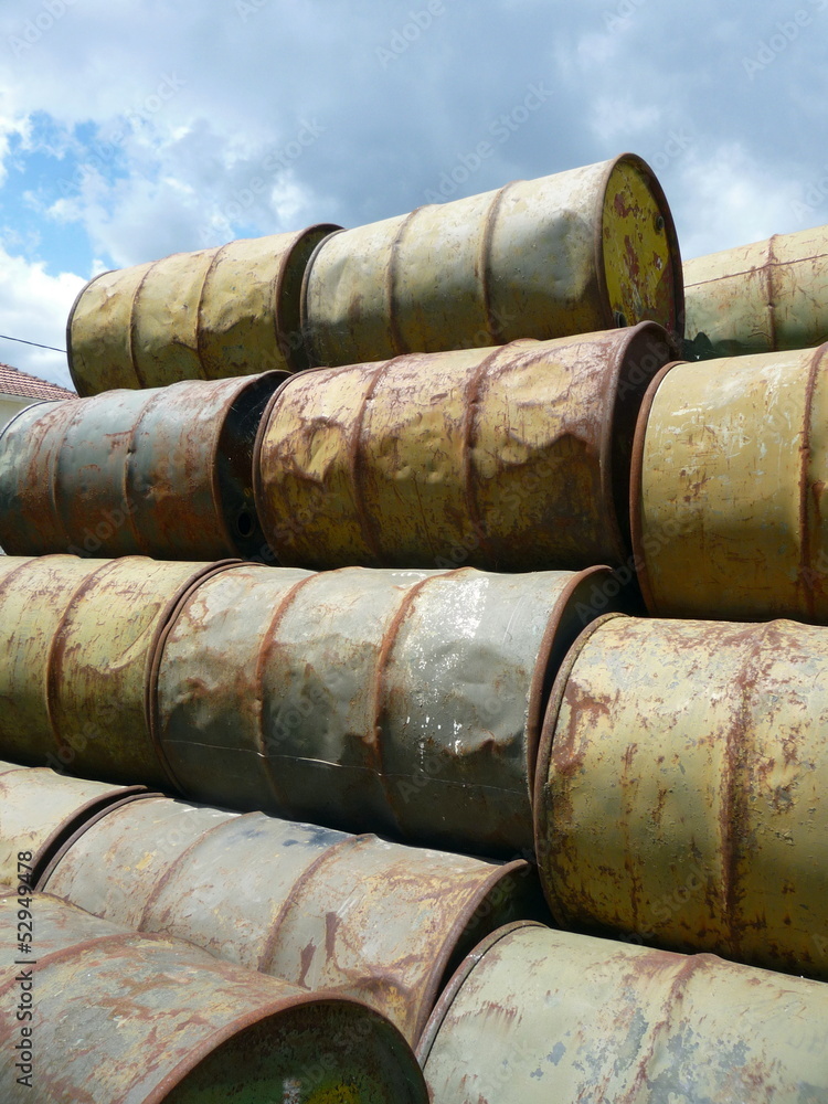 pile of stacked rusty steel oil barrels pile of stacked rusty steel oil barrels