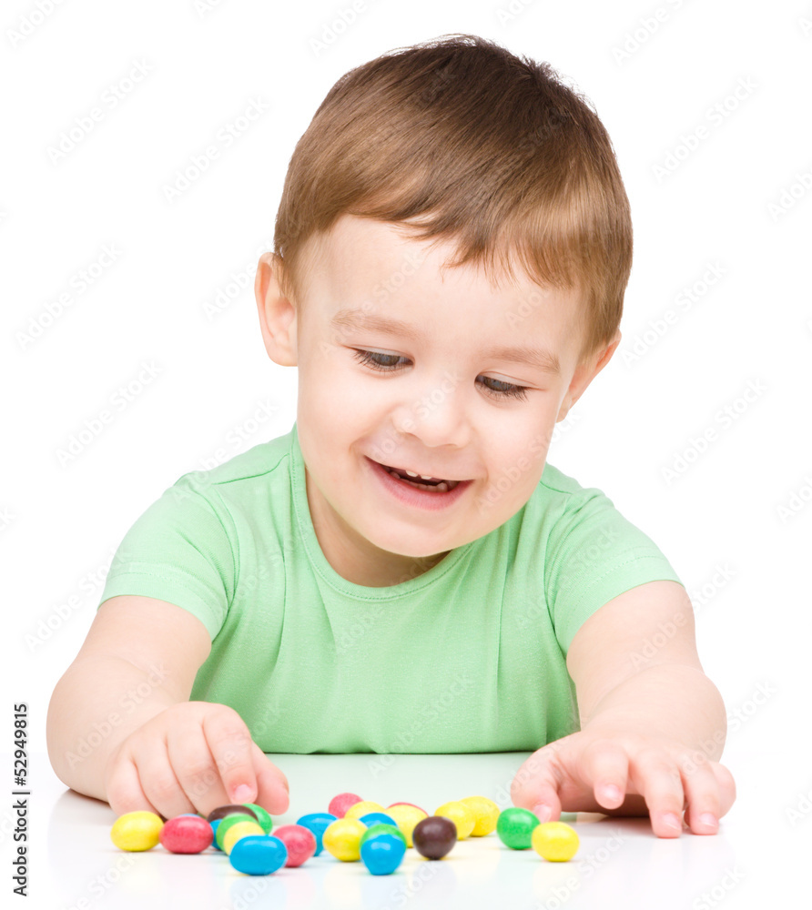 Portrait of a boy with candies Portrait of a boy with candies