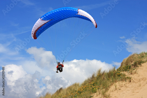paraglider on sand dunes