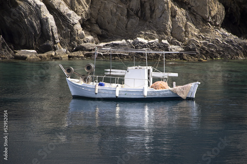 Small white fishing boat © images and videos