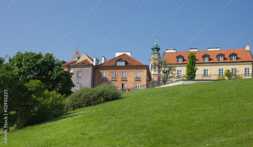 colorful houses of warsaw old town over green hill colorful houses of warsaw old town over green hill