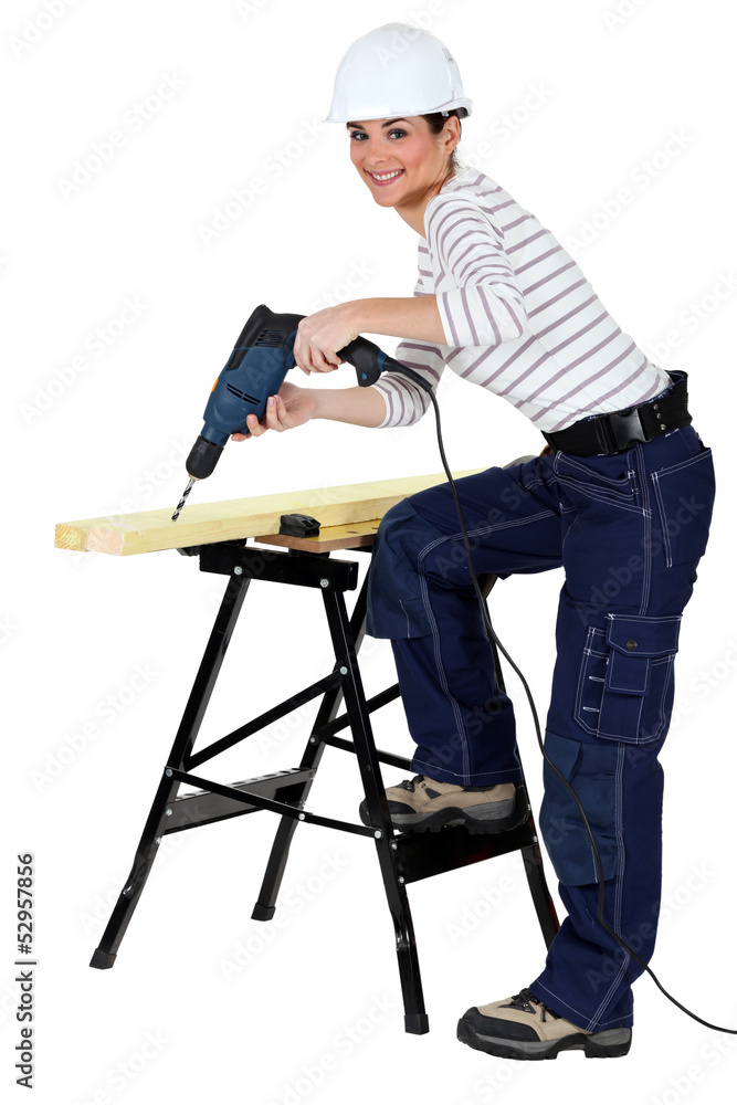 Girl using drill Girl using drill