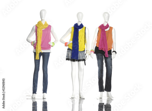 female dress with colorful scarf on three mannequin